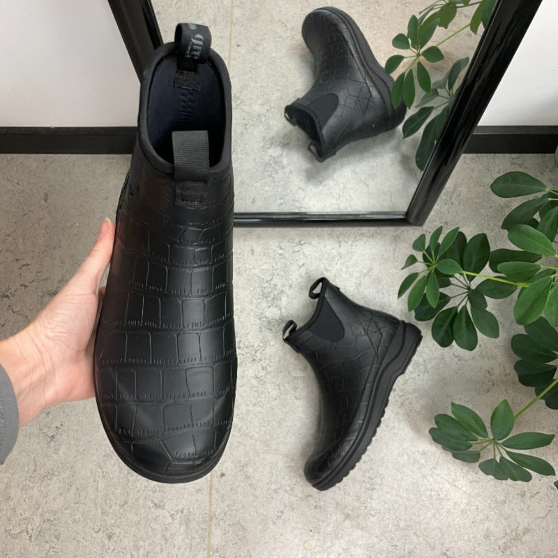 Lyxig svart mönstrad gummistövel med fotvalvsstöd