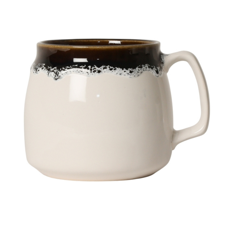 Kaffekopp med handtag i creme
