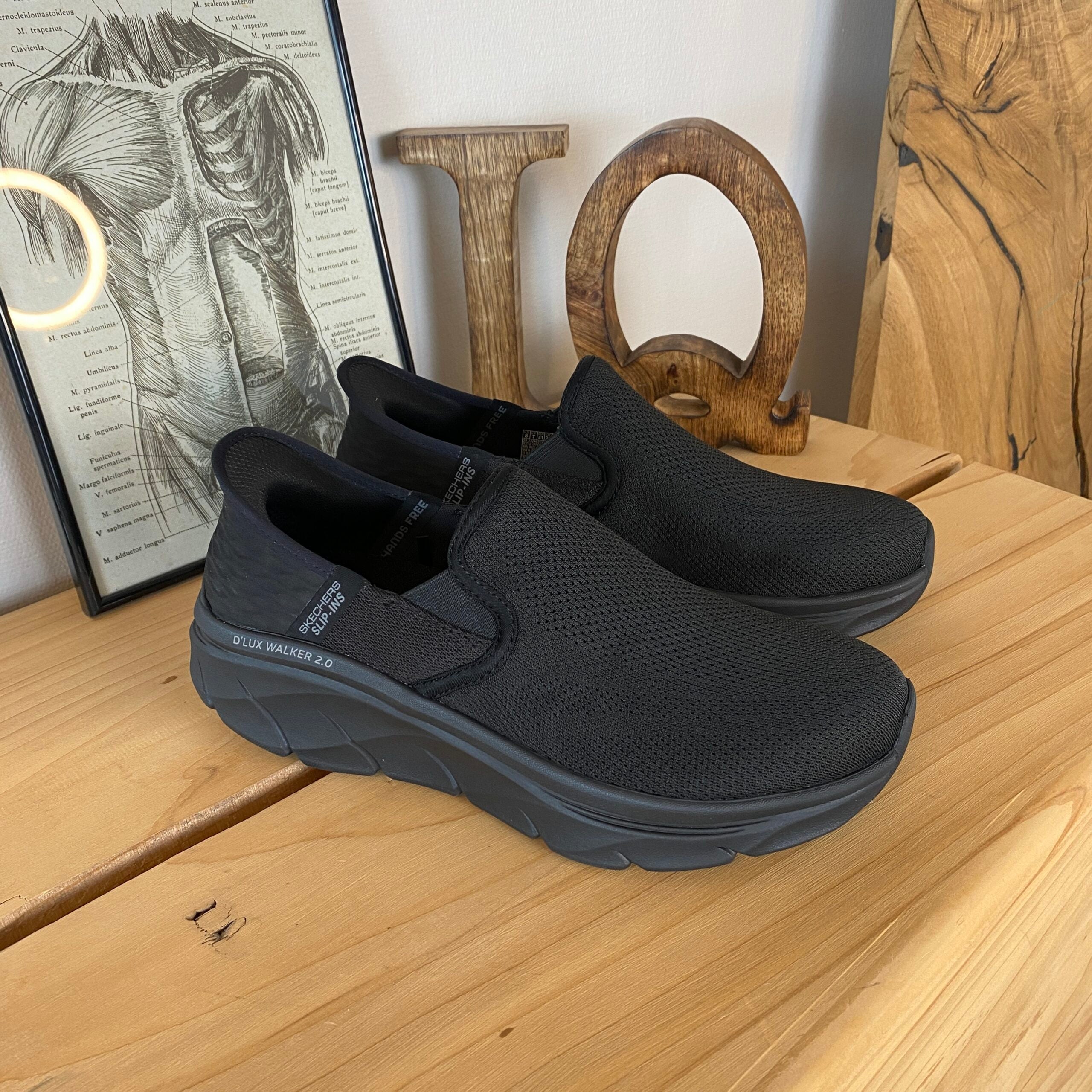 Svarta herr slip-in-skor från Skechers
