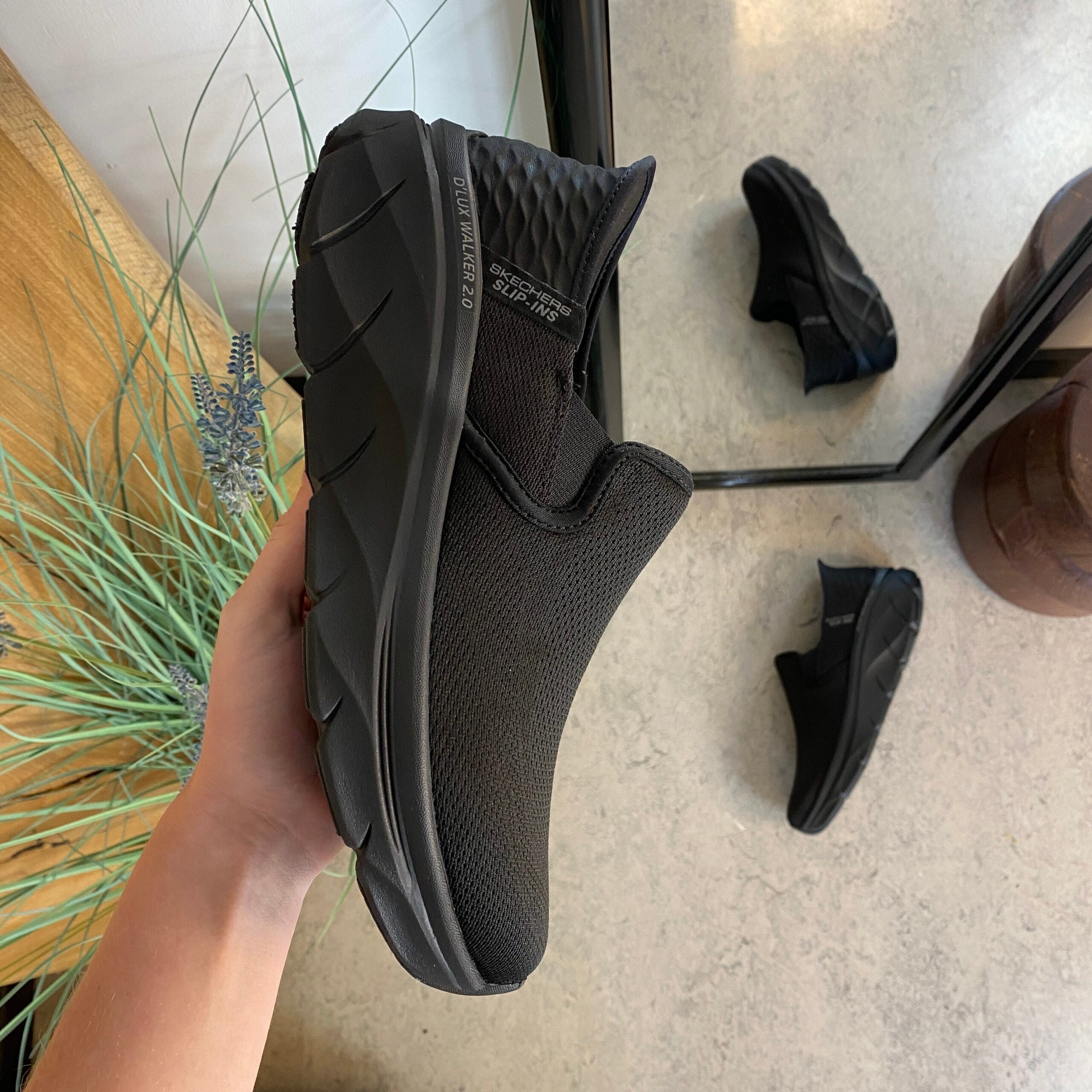 Svarta herr slip-in-skor från Skechers