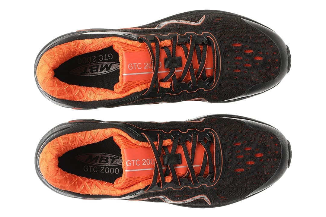 Svart MBT 2000 Black Mars löparsko för män sett uppifrån, med orange detaljer och rullsula.