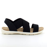 Svart sandal med bred resår över vristen