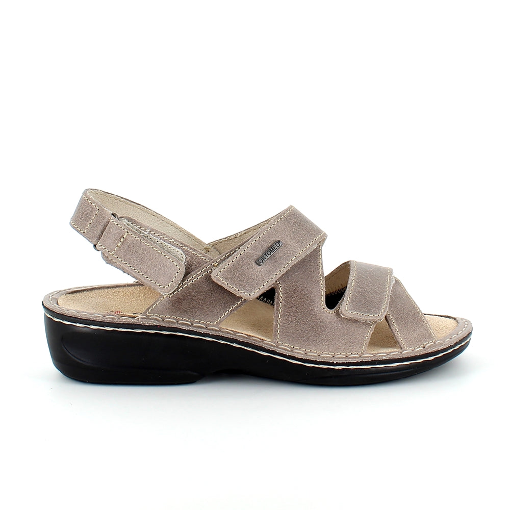 Bred skinnsandal för knölar