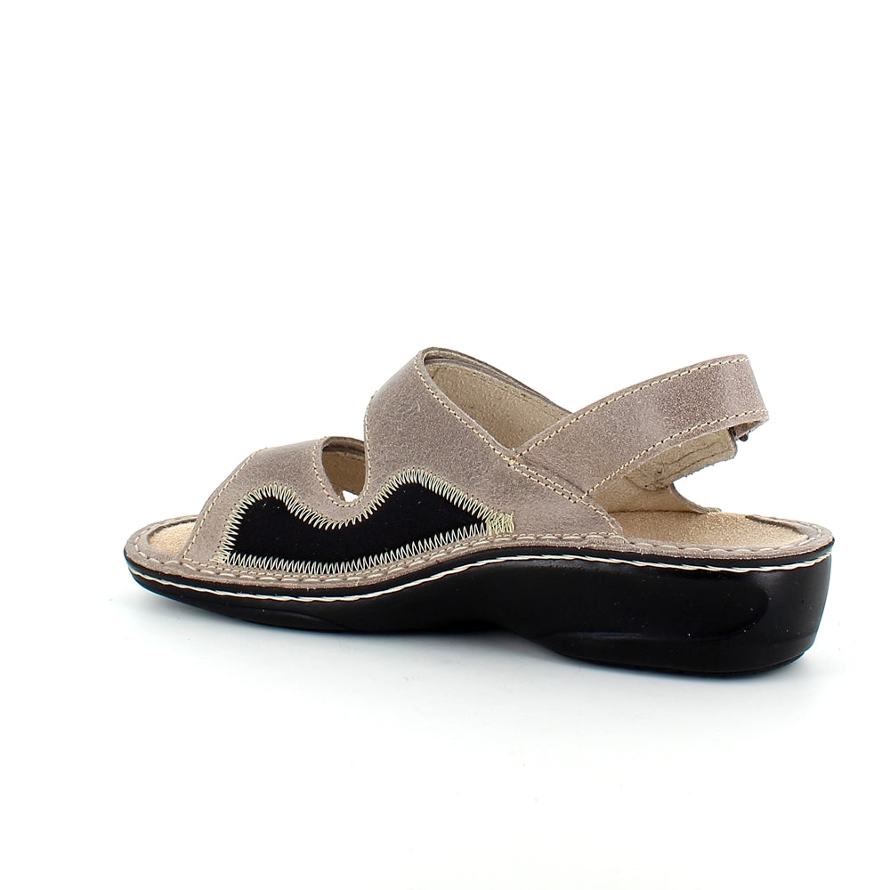Bred skinnsandal för knölar