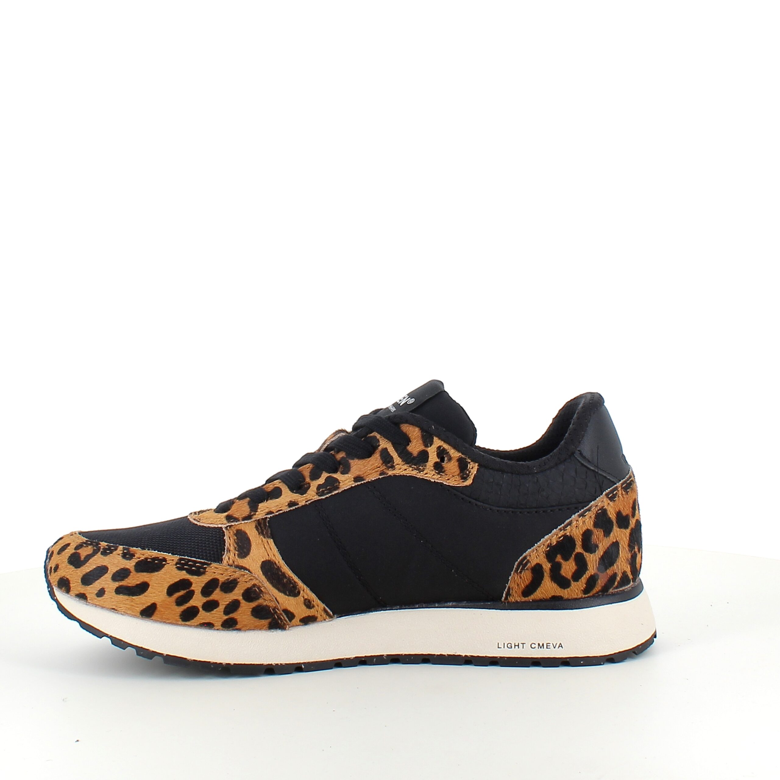 Snygga Woden-sneakers i svart mix med leopardmönster