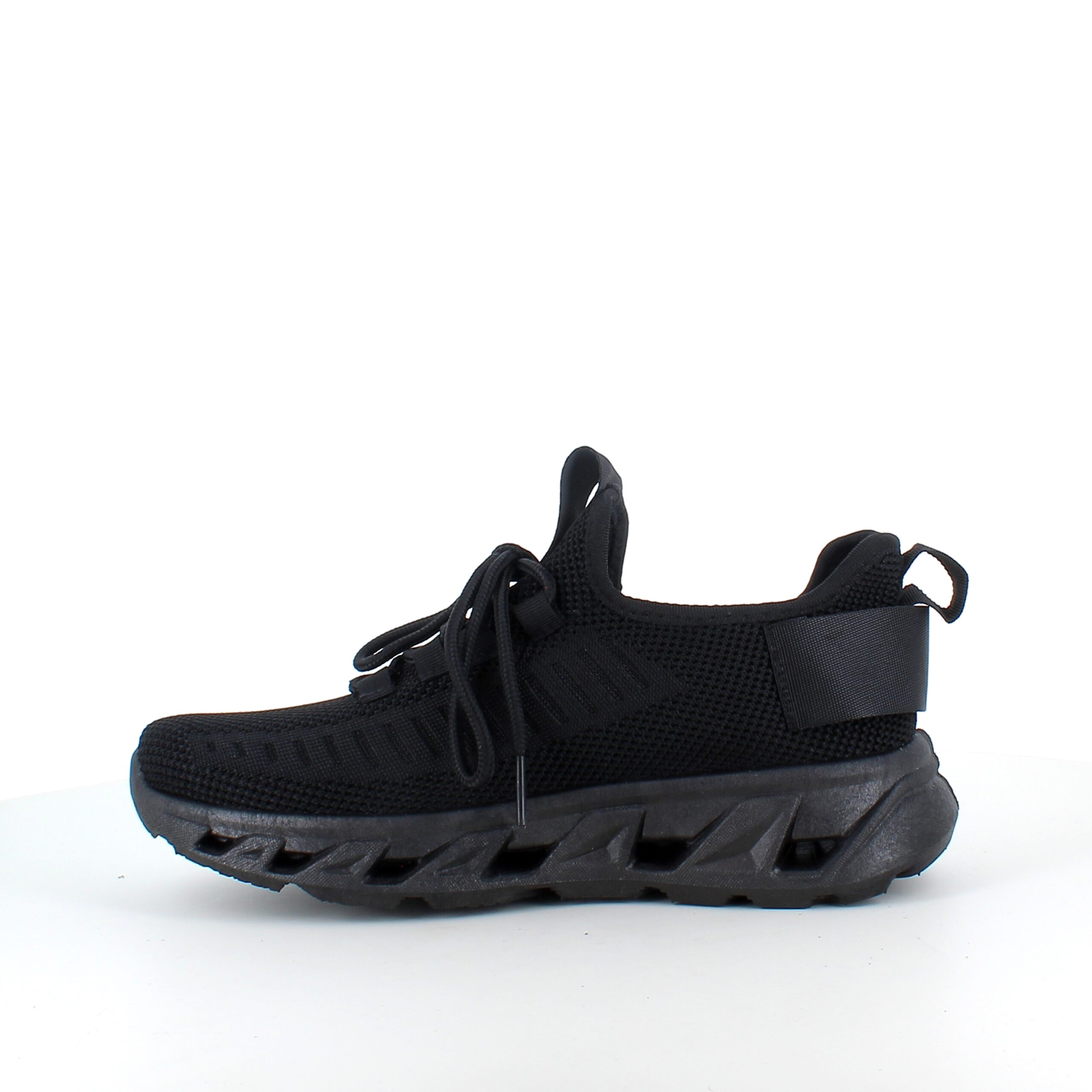 Svarta slip-on sneakers med stickad ovandel