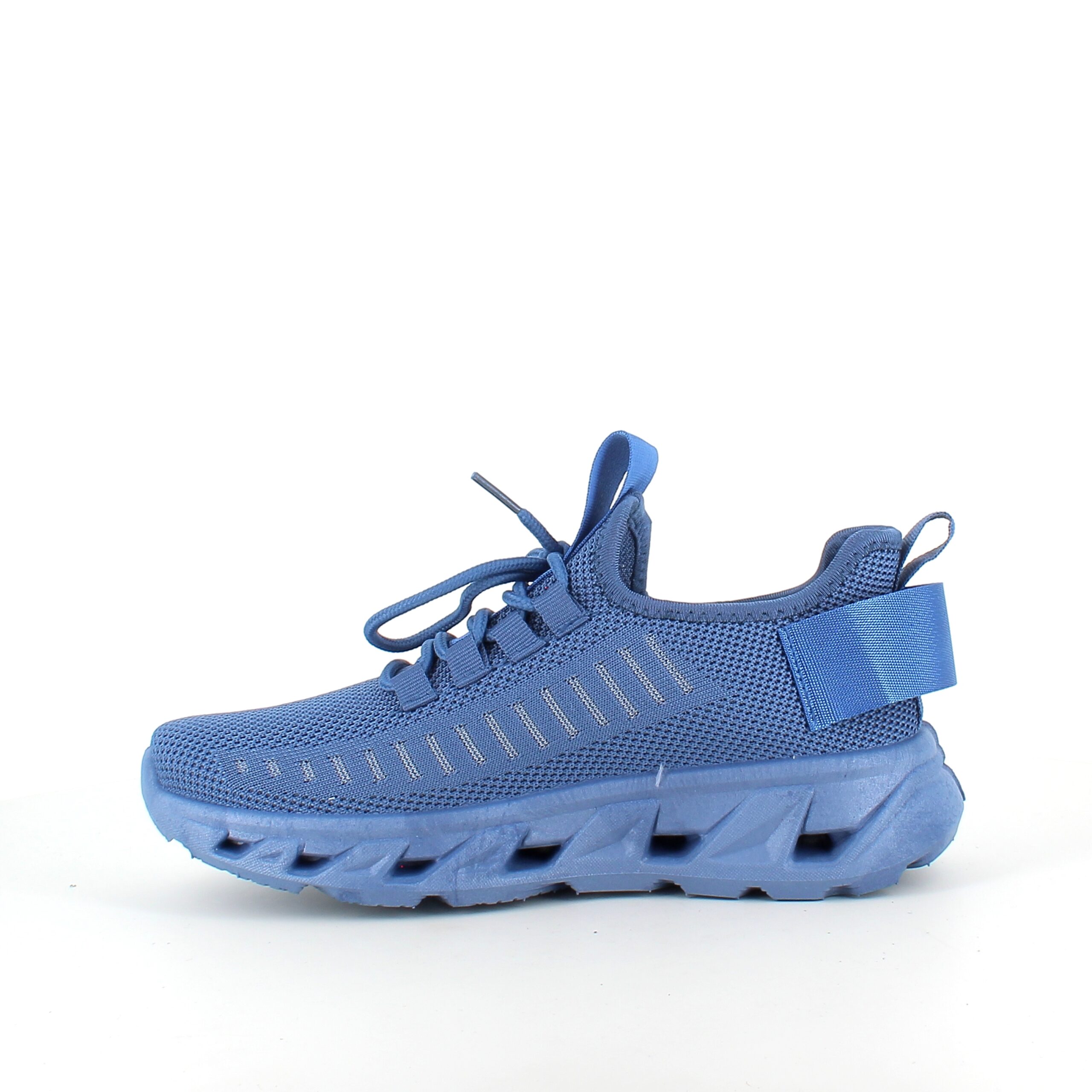 Blå slip-on-skor med stickad ovandel