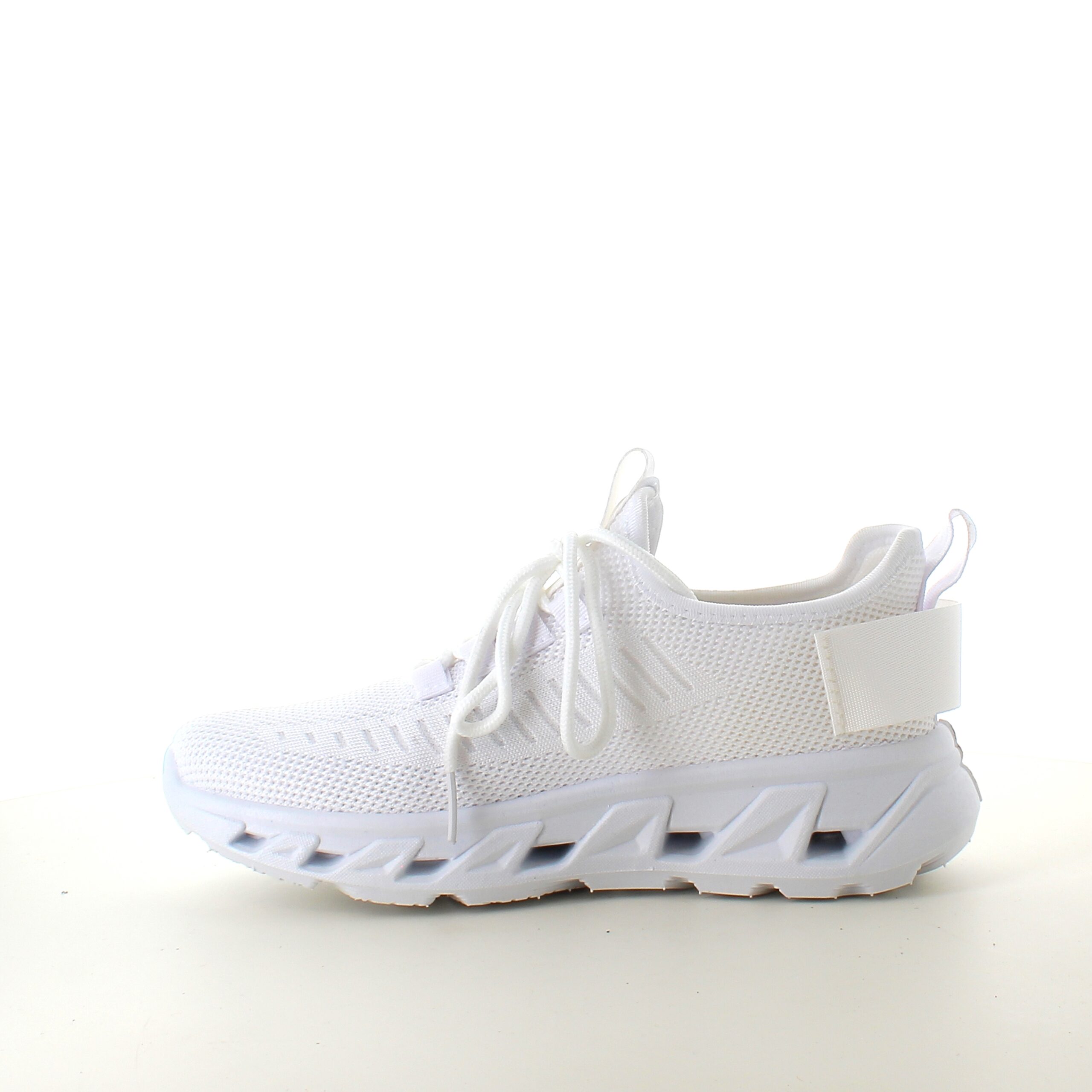 Vita slip-on sneakers med stickad ovandel