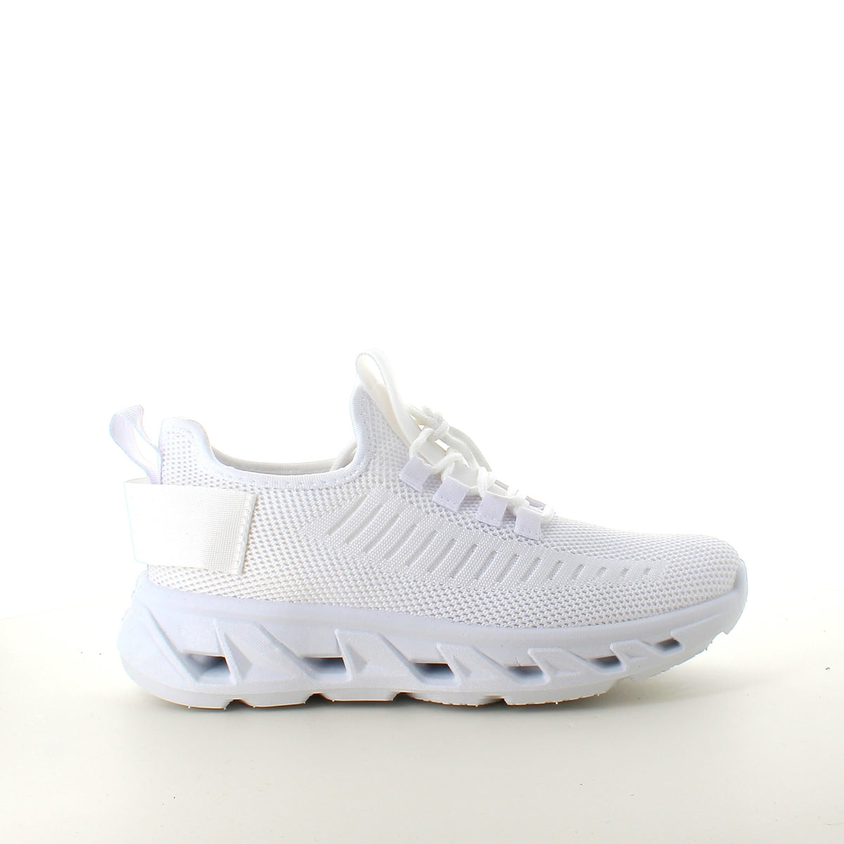 Vita slip-on sneakers med stickad ovandel
