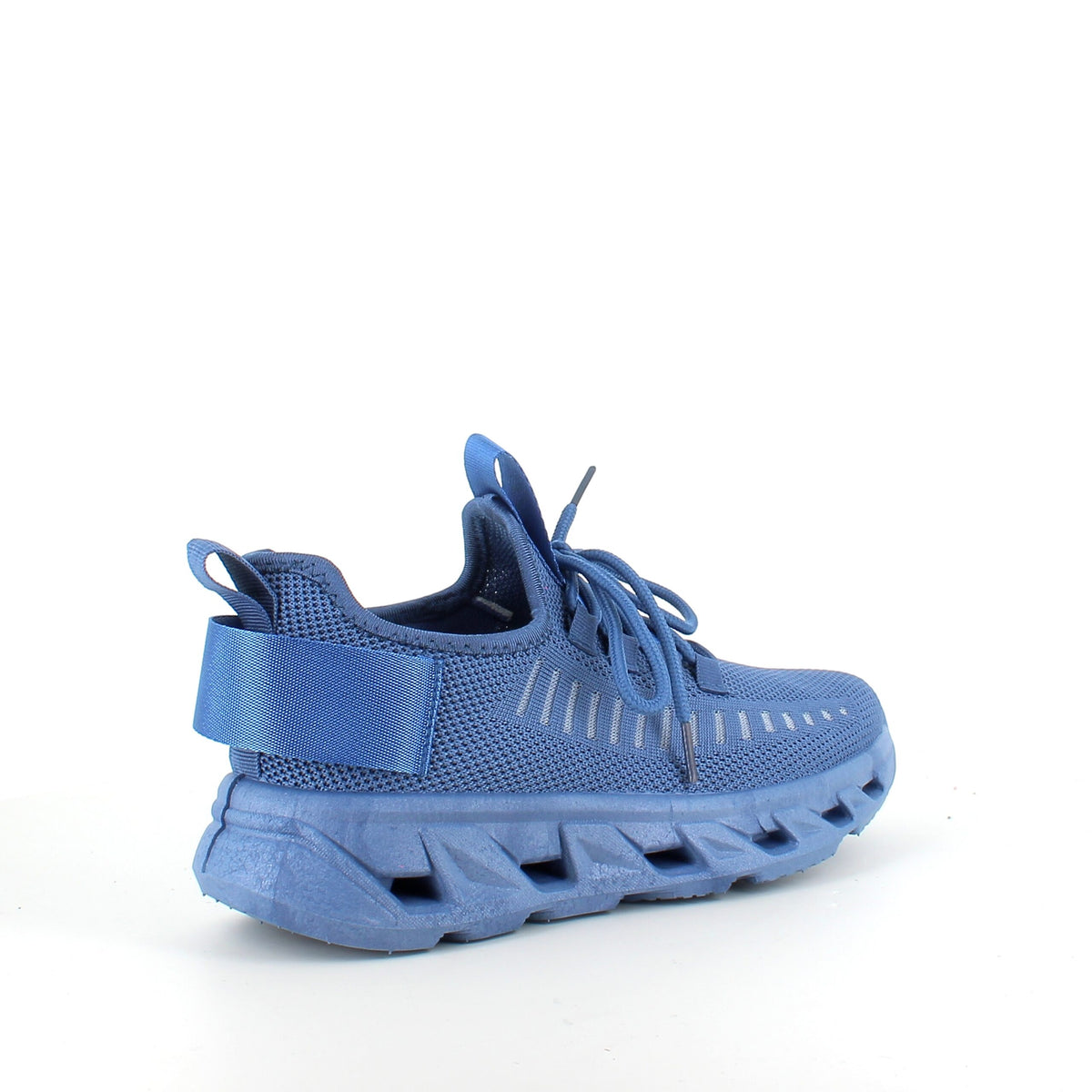 Blå slip-on-skor med stickad ovandel