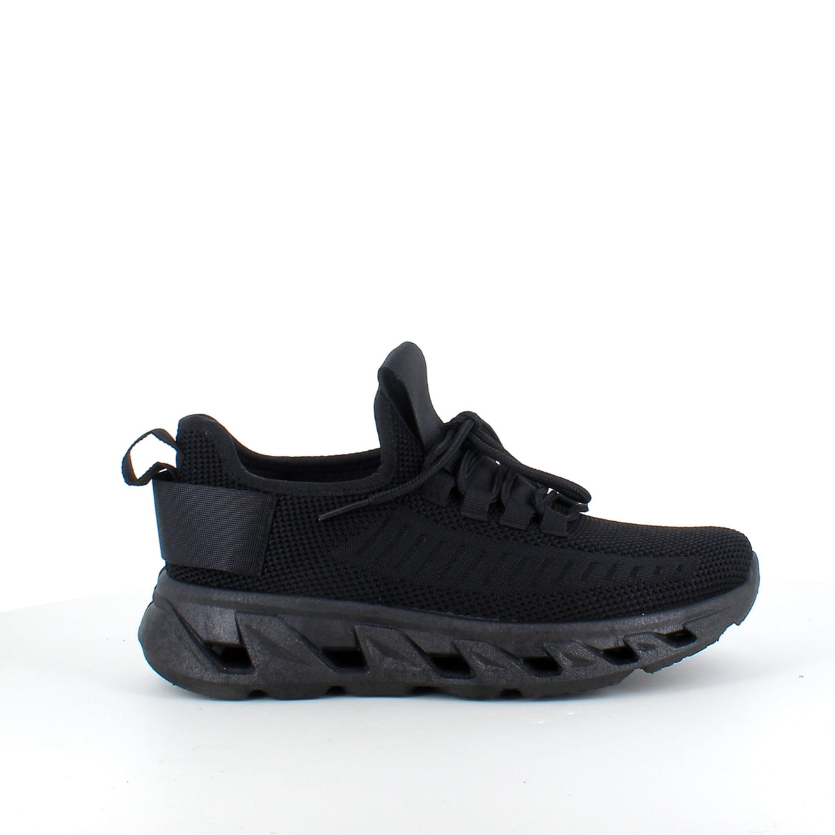 Svarta slip-on sneakers med stickad ovandel