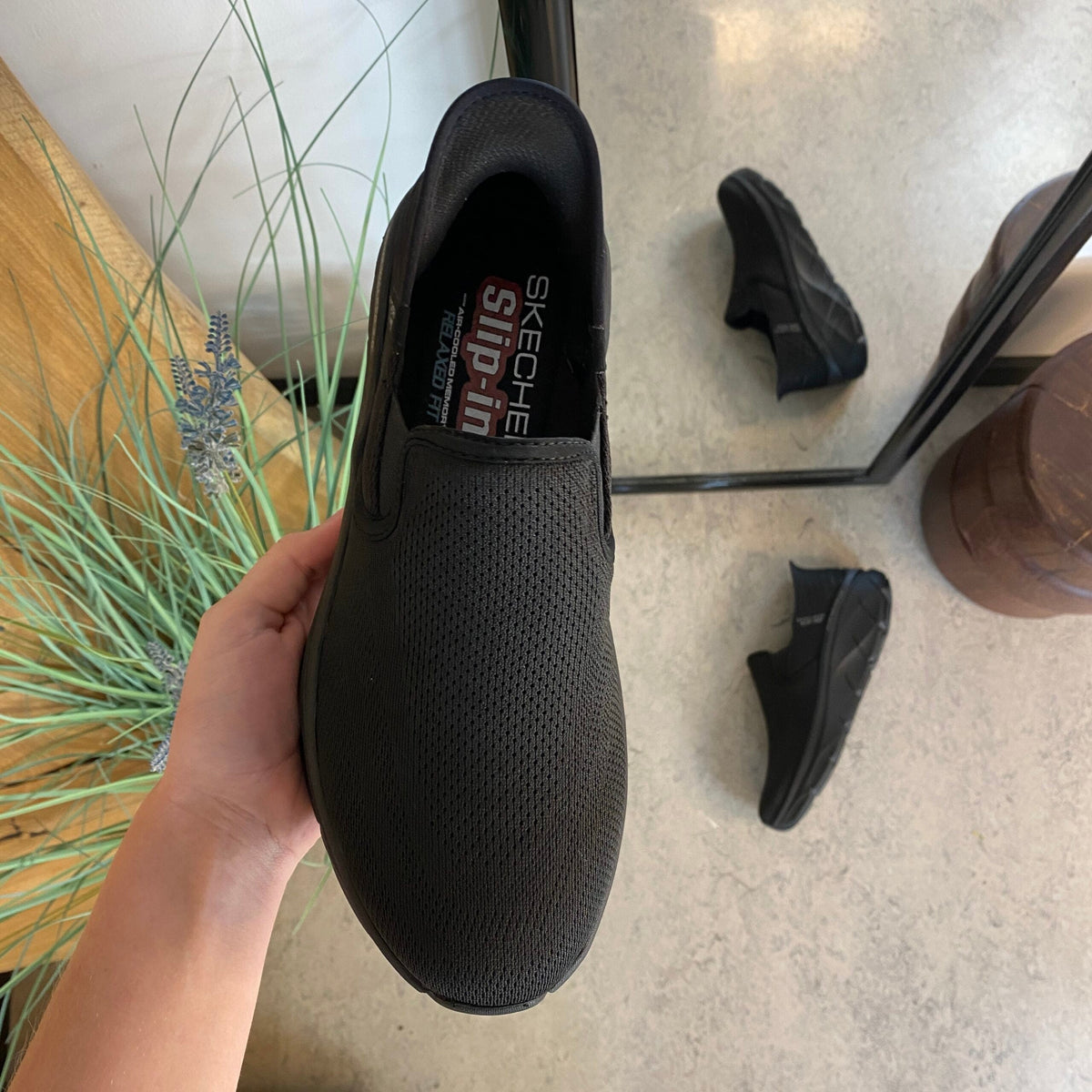 Svarta herr slip-in-skor från Skechers