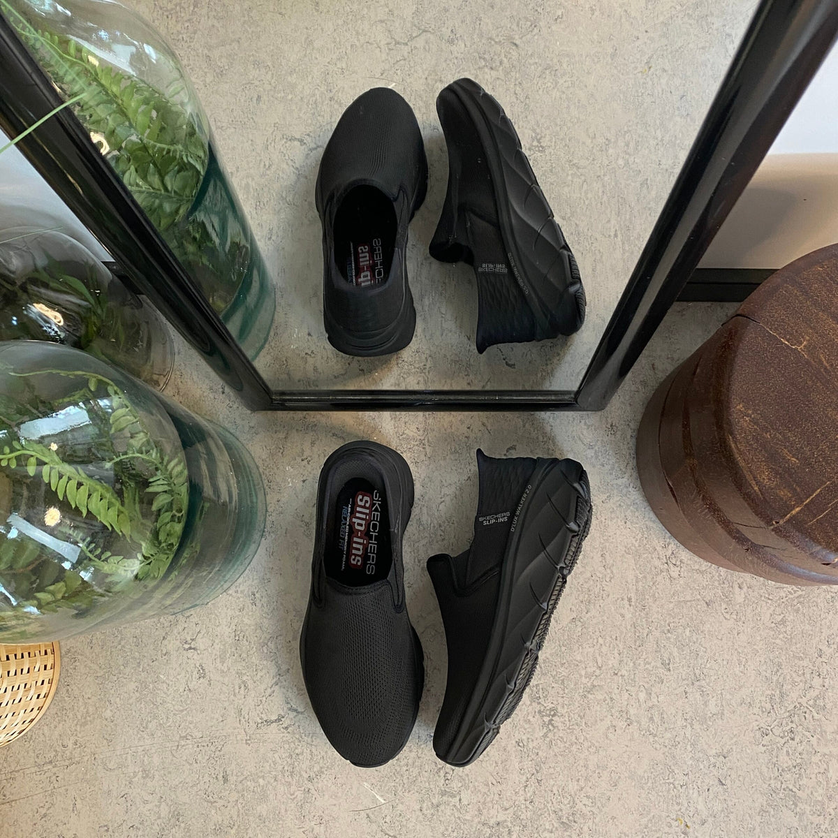 Svarta herr slip-in-skor från Skechers