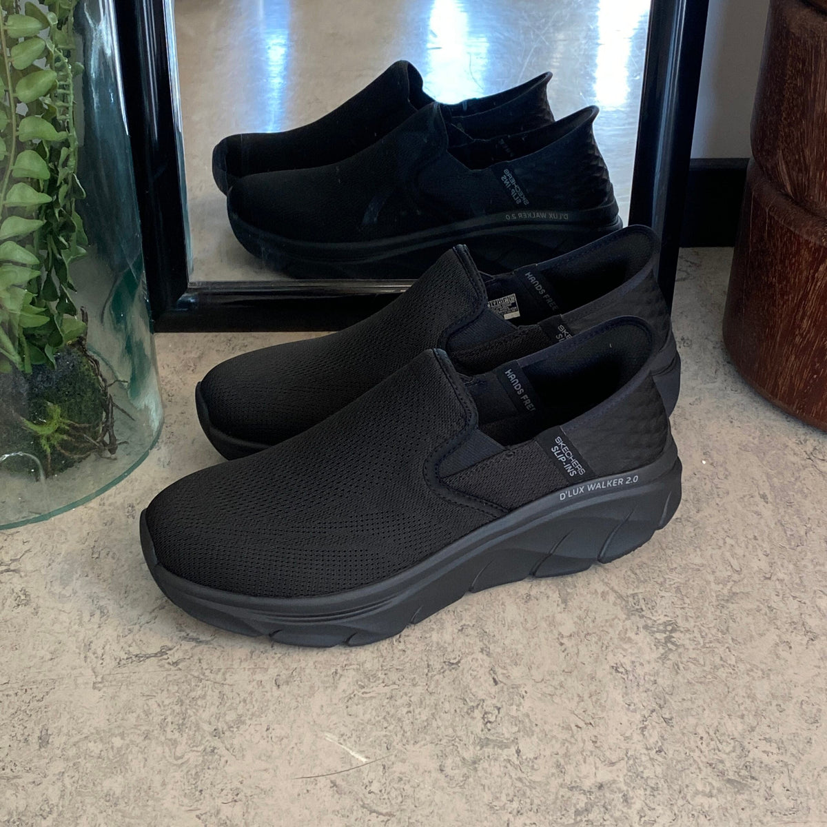 Svarta herr slip-in-skor från Skechers