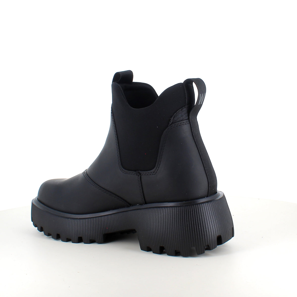 Svart WODEN Isabella Waterproof – stövel i gummi med stötdämpande komfort