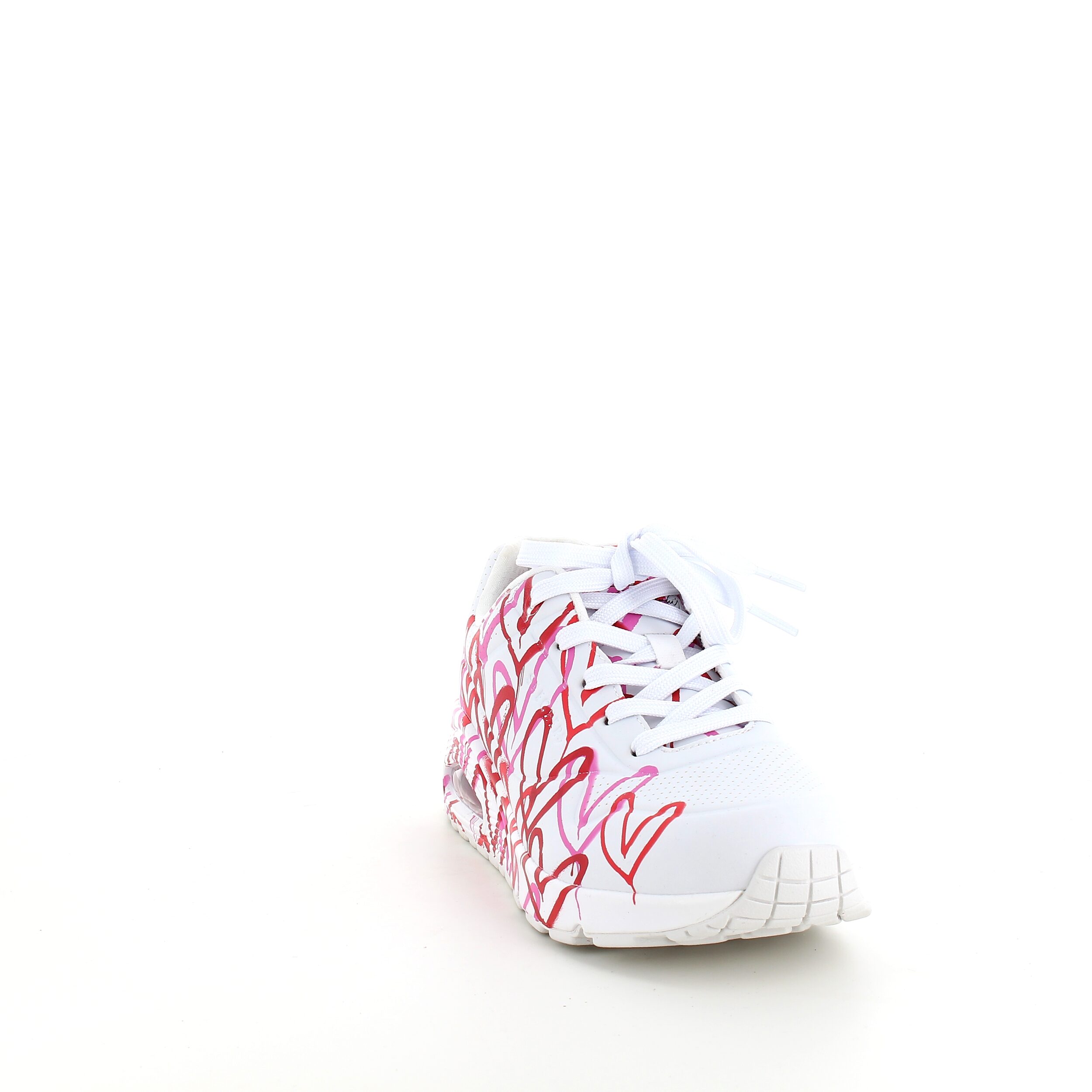 Vita Skechers-skor med fina detaljer