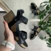 Svart skinnsandal från Green Comfort med kilklack