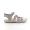 Elegant beige sandal från Skechers med elastiska remmar