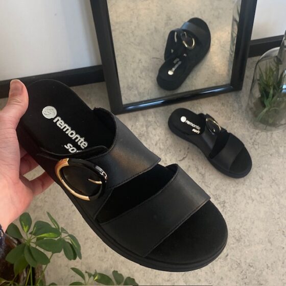 Svart Remonte slip-on skinnsandal med urtagbar sula