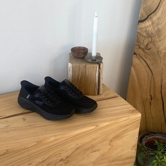 Svarta Skechers Slip-Ins med stretchöverdel