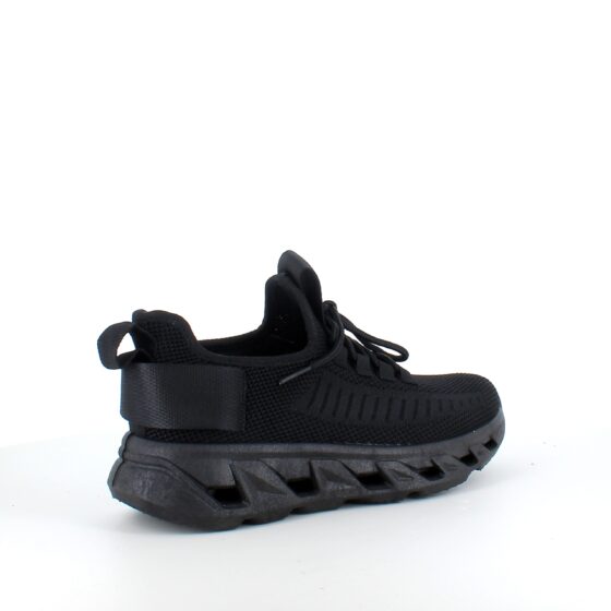 Svarta slip-on skor med stickad ovandel