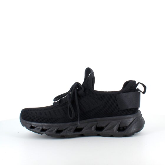 Svarta slip-on skor med stickad ovandel