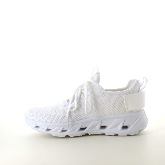 Vita slip-on skor med stickad ovandel